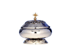 Add to Cart Smooth silver ciborium with liturgical elements in relief Smooth silver ciborium with liturgical elements in relief