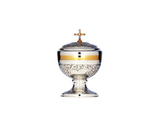 Add to Cart Chiselled silver ciborium with Cross and golden details Chiselled silver ciborium with Cross and golden details