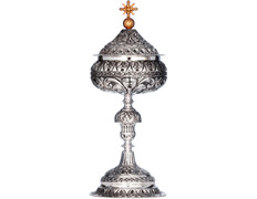 Add to Cart Silver ciborium with elements in relief and golden Cross Silver ciborium with elements in relief and golden Cross
