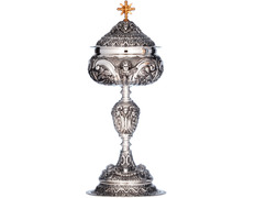 Add to Cart Silver ciborium with cherub faces in relief Silver ciborium with cherub faces in relief