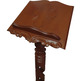 Lectern made of carved wood with circular foot